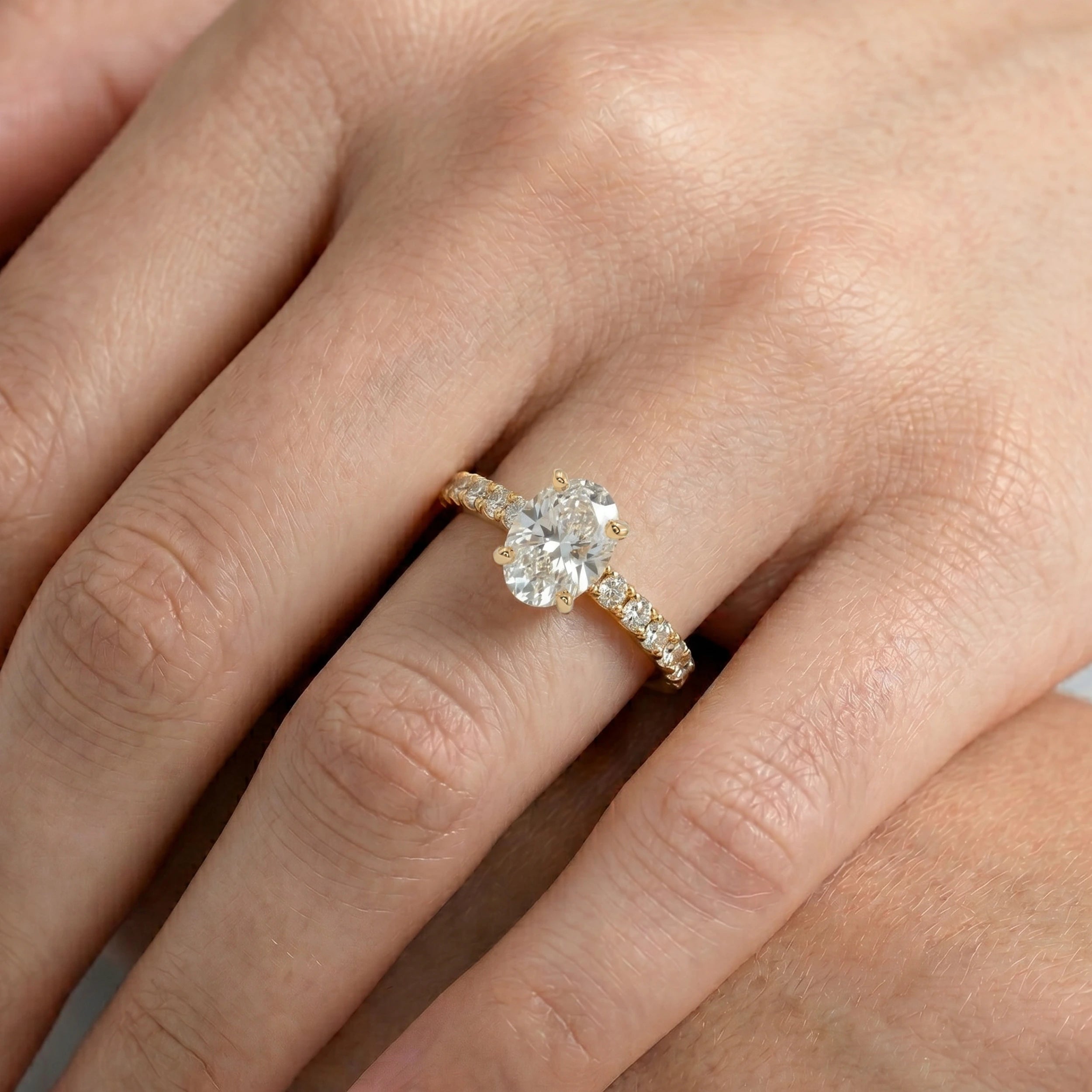 Oval Cut Diamond Solitaire Accent Ring Rings