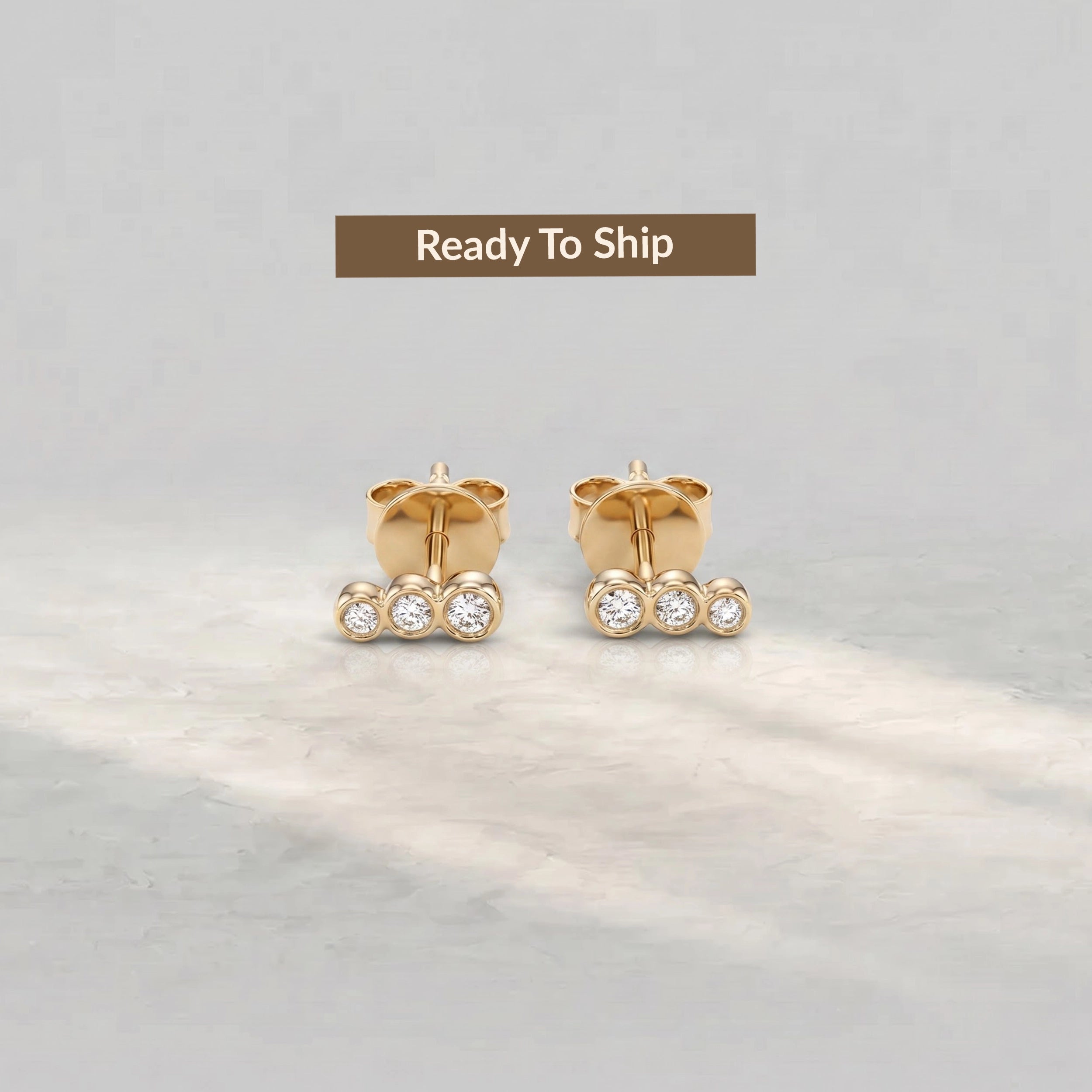Bezel Set Three Diamond Stud Earrings